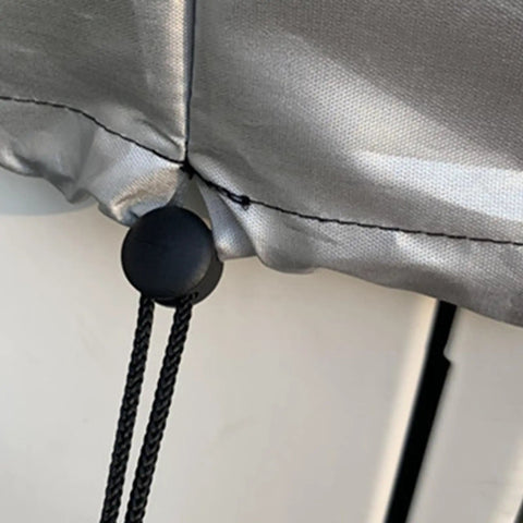 Close-up of drawstring and toggle on the Rock Solid Weatherproof Cover For Your EV Charging Station And Wall Connector Box.