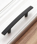 Top Tier Matte Black Cabinet Pulls And Drawer Handles 10 Pack Solid Metal Kitchen Hardware Built Tough With Smooth Rounded Corners viewed from above.