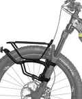 TetraRack M1 Fork Mount Rack For Bikes, Adjustable Top Plate Keeps Loads Level, visible on front fork with hook-and-loop strap attachment.