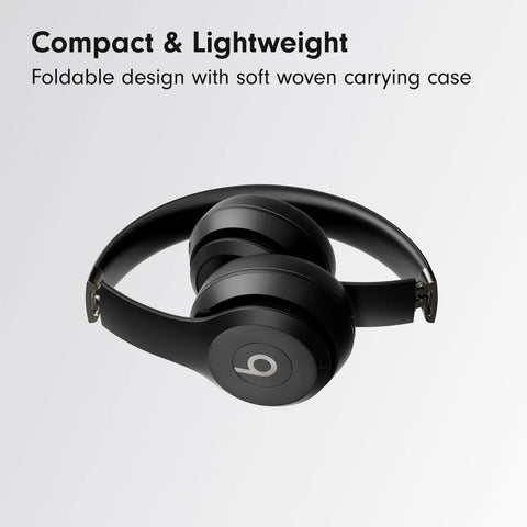 Solo 4 Wireless Bluetooth On-Ear Headphones Serving Serious Heat And 50-Hour Battery Life For Your Daily Ride Built With Ultra Lightweight Flex-Grip Cushions And Immersive Spatial Audio Technology In Matte Black, shown in a folded position with a soft woven carrying case.