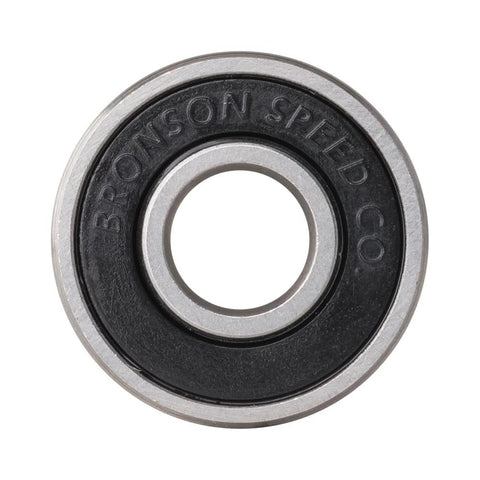Bronson Speed Co ceramic skateboard bearing, front view, black outer race with silver inner ring