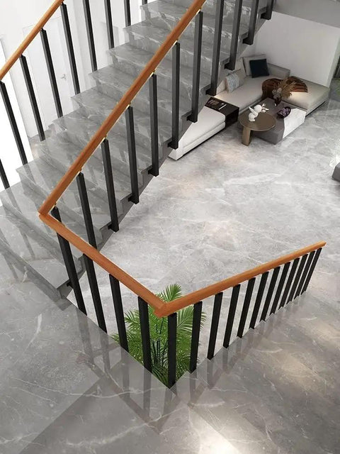 Level Up Your Space With This Rock Solid Wrought Iron Railing Kit Featuring Square Metal Spindles Heavy Duty Side Mount Brackets Fasteners Ideal For Porches And Deck Railings, shown on modern staircase.
