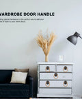2 Pack Vintage Rope Handle Drawer Pulls For Cabinets And Drawers on a dresser, beside a lamp and couch in living room setting.