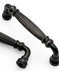Close-up of Slick 4 Inch Oil Rubbed Bronze Kitchen Cabinet Handles with Heft Smooth Pulls for Cabinets and Drawers Dark Satin Finish.