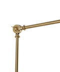 Close-up of brass swing arm from Rattan Wrapped Wall Sconce With Adjustable Swing Arm And Foldable Vintage Bedside Light Gold Finish With Wicker Shade