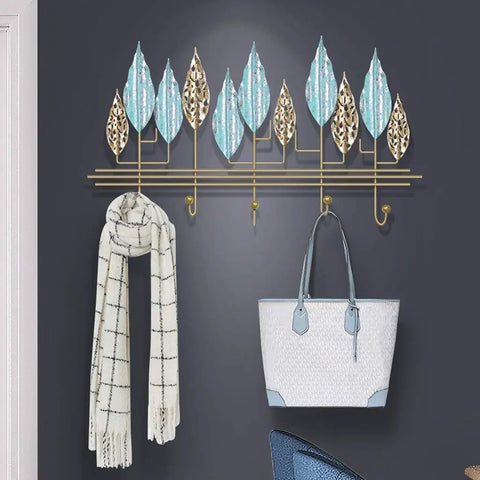 Rock Solid Wall Mounted Coat Rack With Heavy Duty Iron Hooks For Entryway And Mudroom Storage, showcasing bags and a scarf.