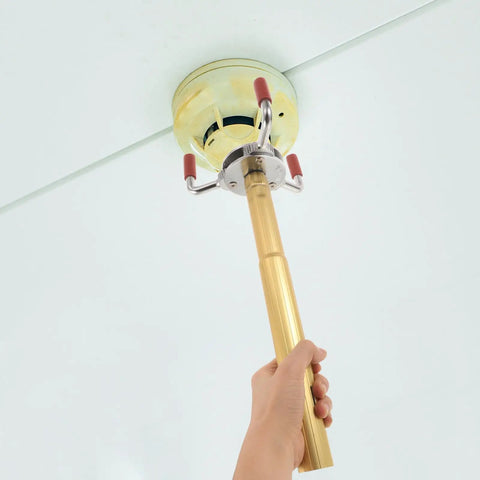 Pro Grade Smoke Sensor Extraction Tool Featuring A Rock Solid Aluminum Claw Grip designed to detach smoke sensors from ceilings.