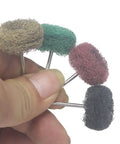 Dope 40 Piece Abrasive Buffing Polishing Fiberglass Wheel Kit With 3/32 Shank includes four different grit buffing wheels in hand.