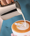 Complete Home Coffee Frother Set With Upgraded Ultra Stand Barista Grade Handheld Milk Foam Maker used to pour latte art