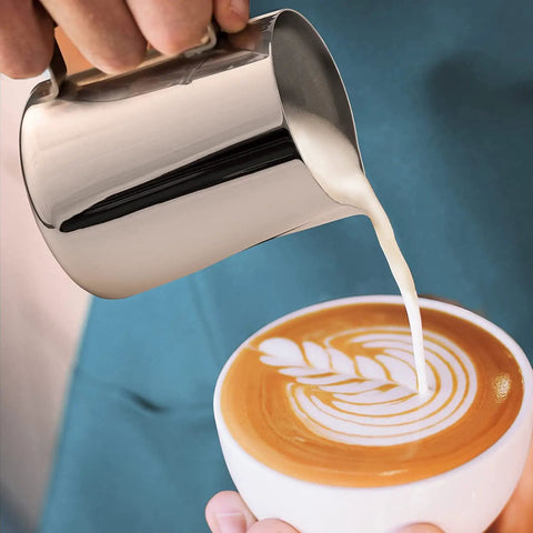 Complete Home Coffee Frother Set With Upgraded Ultra Stand Barista Grade Handheld Milk Foam Maker used to pour latte art