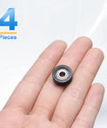 Top Shelf Four Pack Double Shielded POM Roller Bearing Guides Featuring Heavy Duty Nylon Material Delivers Dead Silent Operation And Rock Steady Tracking For Quick Idler Pulley Swaps in hand.