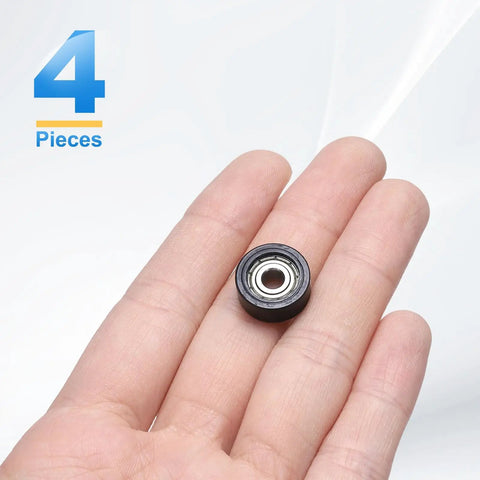 Top Shelf Four Pack Double Shielded POM Roller Bearing Guides Featuring Heavy Duty Nylon Material Delivers Dead Silent Operation And Rock Steady Tracking For Quick Idler Pulley Swaps in hand.