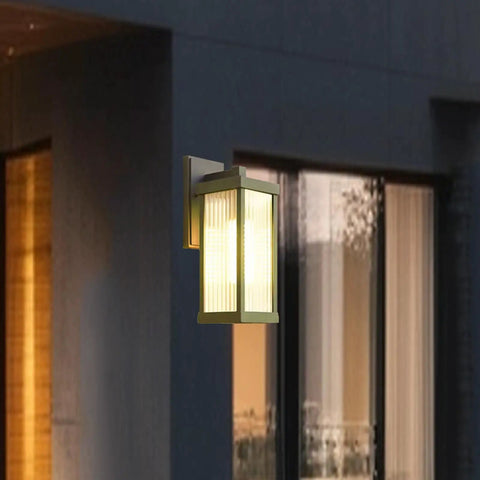 Modern Premium Matte Black Outdoor Wall Lights, Waterproof E26 Porch Lanterns mounted on exterior wall, illuminated glass shade.