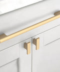 Top Shelf 10 Inch Brushed Gold Cabinet Pulls For Kitchen Drawers And Cupboards with modern design on white cabinetry.