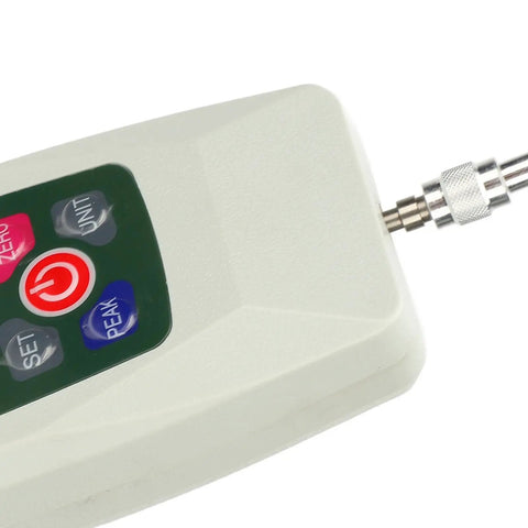 Close-up of Dead Reliable Digital Push Pull Force Meter And Thrust Dynamometer with buttons for mode settings.