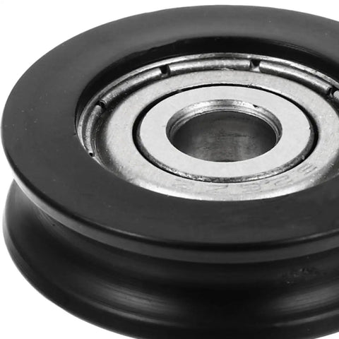 Close-up of No Fuss 4 Pack Premium Black U Groove Nylon Sliding Door Pulley, showcasing durable nylon and metal bearing design.