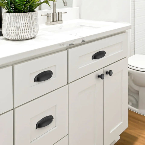 Drop Dead Gorgeous Matte Black Cabinet Pulls And Drawer Cup Handles Three Three Quarter Inch Five Pack on white bathroom cabinetry.