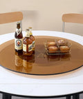 Legit Heavy Duty Tempered Glass Lazy Susan Turntable Slick Rotating Serving Tray 360 Degree Swivel With Solid Stabilized Base serving drinks and snacks on a tabletop.