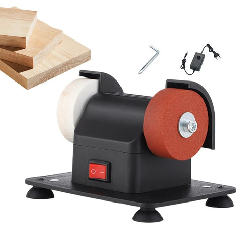 Heavy Duty Mini Bench Grinder Packed With Dual Grinding Wheels For Sharpening And Deburring Compact Tabletop Sander on a workbench.