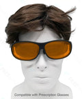 Heavy Hitter Laser Safety Glasses Serving Top Tier OD Plus Protection Against UV And Blue Light Filters For 405nm 445nm 450nm Lasers With A No Sweat Oversized Design In Glossy Black, shown on mannequin.
