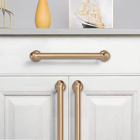 Top Shelf 10 Pack Brushed Brass Cabinet Pulls 5 Inch 128mm Hole Center Drawer Handles For Kitchen And Bathroom Dresser, installed on white cabinet.
