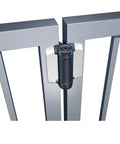 Heavy Duty Self Closing Pool And Child Safety Gate Hinges With Alignment Legs For Metal Gates, chrome hinge mounted on a metal gate.