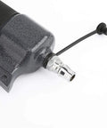 Lightweight Pneumatic Nail Gun For Trim And Finish Work, air connector detail on durable metal body pin nailer for woodwork.