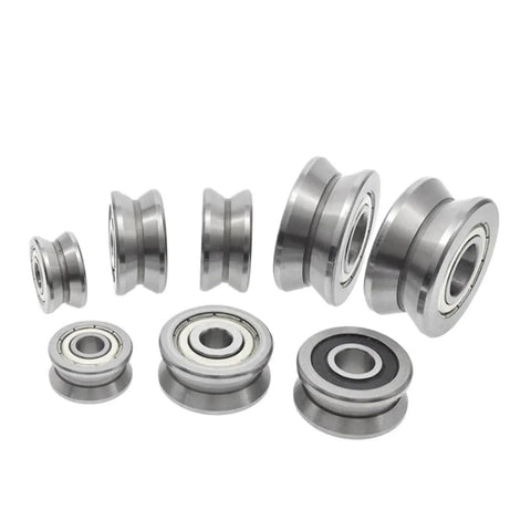 Top Shelf V Groove Guide Roller Bearing L203 ZZ Self Aligning Ball Bearing set displaying various sizes and profiles with a stainless steel finish.