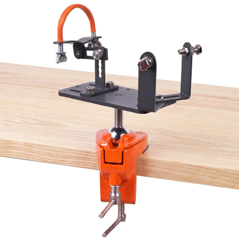 Adjustable Angle Grinder Holder with a Savage Grip Vise Base for hands-free grinding tasks, featuring a sturdy orange clamp.