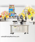 Slick Automatic Top And Flat Labeling Machine For Cards And Everyday Merchandise With Plug And Play Industrial Packaging Setup on a table.