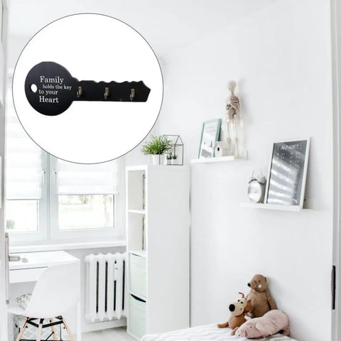 Old School Key Shaped Wall Mounted Coat Hooks Rack In Durable Black Oak Wood For Entryways And Closets Decorative Hanging Organizer on white wall.