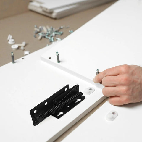 Spring Loaded Cabinet Door Hinges Pair For Folding Beds And Sofas Beefy Steel Construction Black Finish installation close-up