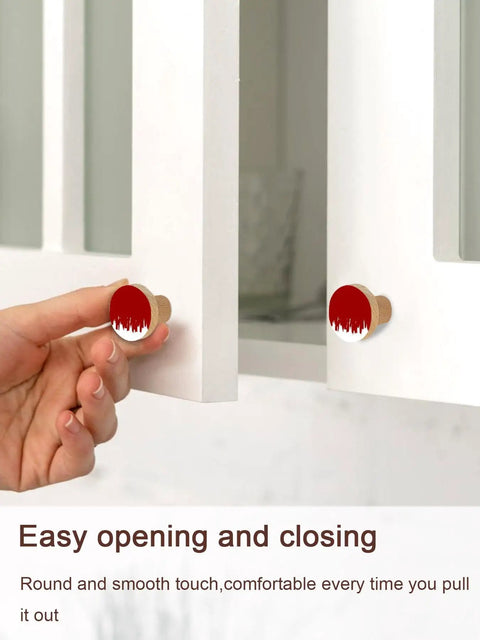 Top Tier Beech Wood Cabinet Knobs Round Drawer Pulls One Point Four Inch abstract red and white knobs on kitchen cupboard.