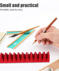 12 Piece Modular Wrench Storage Rack Magnetic Tool Holder Organizer Tray in red plastic shown with writing tools.
