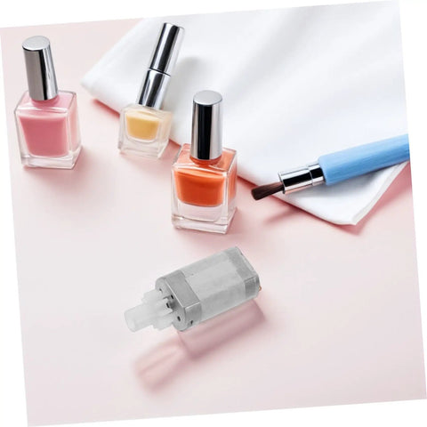 High Torque Nail Drill Motor Replacement For Electric Manicure File, 7.4V DC Low Noise Handheld, Stable Operation, Quick Material Removal, Built For Nail Techs And DIY Nail Pros. Silver motor shown with nail polish bottles.