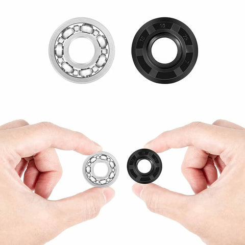Heavy Duty Water Pump Gasket Seal Rebuild Kit For Polaris Trail Boss 350L And Sportsman 400 Two Stroke Atv Replacement Parts showing a metal bearing and a rubber seal.