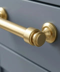 Close-up of Real Deal 5 Inch Brushed Gold Cabinet Pulls and 10 Pack Drawer Handles For Kitchen Refresh on a drawer.