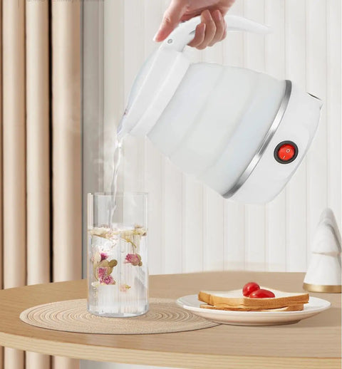 Foldable Travel Kettle For Camping Portable Silicone Collapsible Teapot With Auto Shutoff Safe Materials pouring hot water into glass