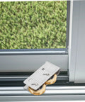 Rock Solid Heavy Duty Double Wheel Sliding Door Pulley Two Pack Stainless Steel Roller Kit on metal track by window.