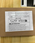 Tough As Nails Coiled Extension Cord With 6 Meter Extra Reach packaging showing manufacturer details and warning instructions.