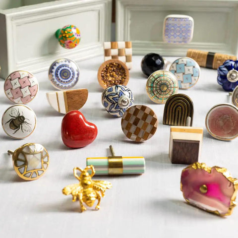 Assorted designer cabinet knobs displayed; includes brown ceramic knobs with floral design, part of Brown Ceramic Cabinet Knobs Pack Of 6 Modern Drawer Pulls With A Cool Floral Designer Look For Dresser And Cabinets Premium Handmade Hardware Rust Free And Durable Easy To Install For A Fresh Custom Look.