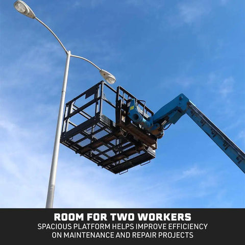 Rock Solid Four By Six Foot Mesh Telehandler Work Platform With Heavy Duty Safety Cage For Forklift Aerial Access And No Sweat Roof Tree Painting Jobsite Repairs, shown in use with two workers.