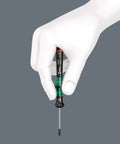 Hand holding Kraftform Micro 2035 Slotted Electronics Precision Screwdriver with 2mm tip and 100mm blade, ergonomic handle.