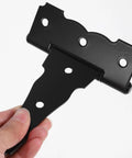 Close-up of Beefy Heavy Duty T Shaped Iron Gate Hinges 2 Pack For Doors And Windows Matte Black Finish in hand