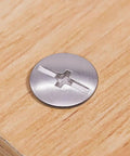 Heavy Duty Rock Solid Chicago Binding Screws M5 X 20mm Cross Head 304 Stainless Steel on wood surface close-up