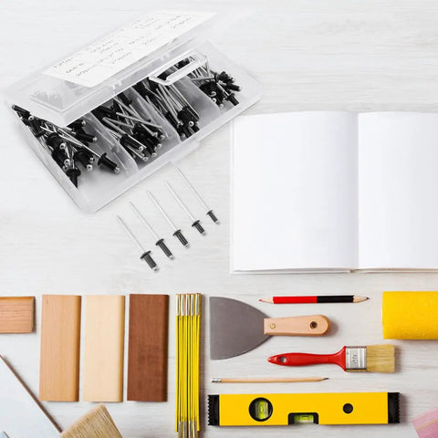 DIY Friendly Blind Rivets And Standard Head Size Assortment Kit 120 Pcs Aluminum Black M2.4 M3.2 M4 on table with tools