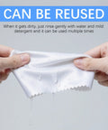 White microfiber cleaning cloth for glasses and screens being wrung by hands (close-up)