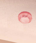 Universal Fire Alarm Covers 96 Pack Elastic Smoke Detector Caps protect smoke detector with a pink cover from dust.