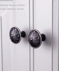 Rock Solid 8 Pack Oil Rubbed Bronze Cabinet Knobs Featuring Heavy Duty Floral Details For Rustic Kitchen Cabinetry And Dresser Drawers Finished In Antiqued Bronze on cabinet doors.