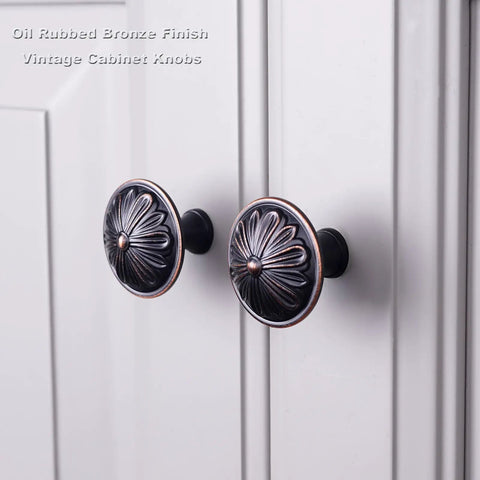 Rock Solid 8 Pack Oil Rubbed Bronze Cabinet Knobs Featuring Heavy Duty Floral Details For Rustic Kitchen Cabinetry And Dresser Drawers Finished In Antiqued Bronze on cabinet doors.